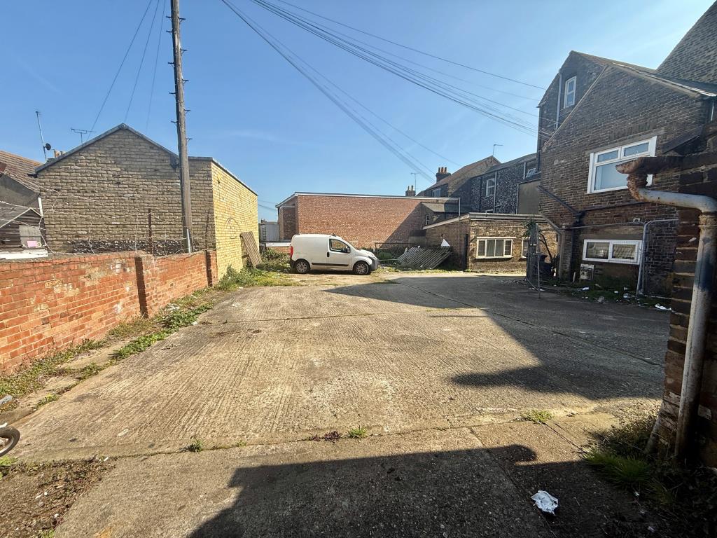 Lot: 162 - TOWN CENTRE BUILDERS YARD/WORKSHOPS WITH PLANNING FOR REDEVELOPMENT - Hardstanding area